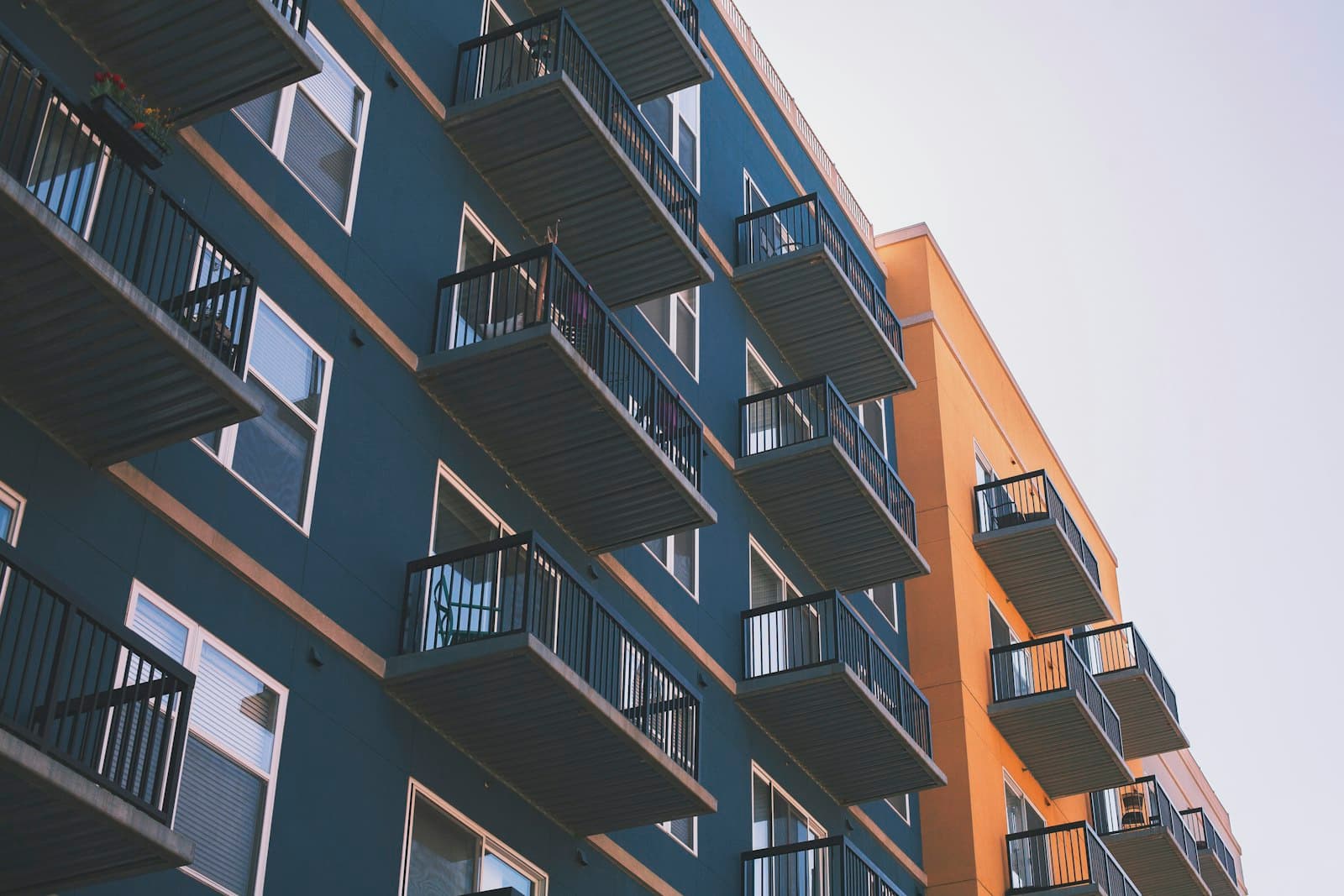 Multifamily apartment building of the kind acquired through real estate syndication